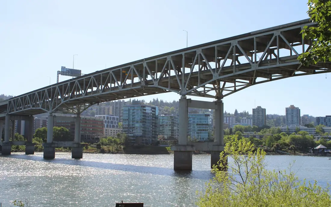 Steel arch truss bridge over a river